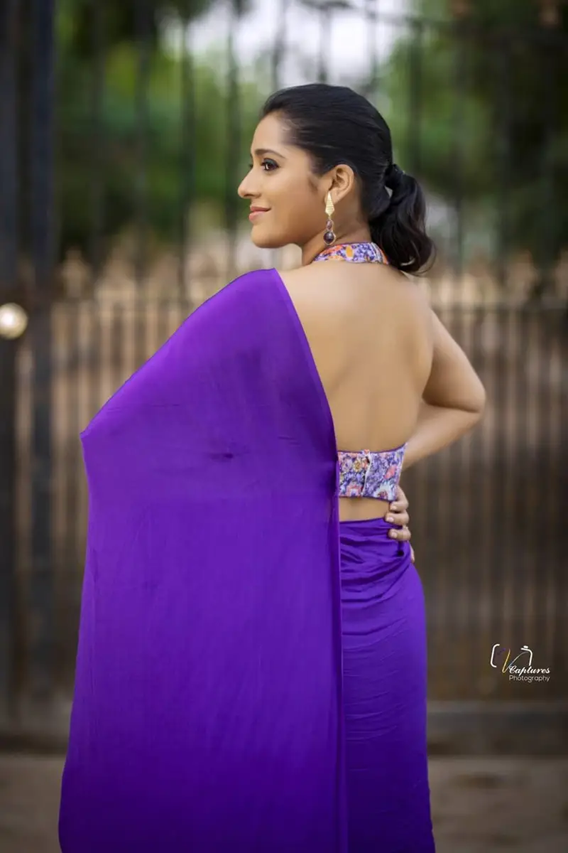 Rashmi Gautam Charming Stills In Blue Saree Sleeveless Blouse